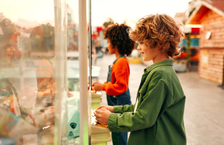 Kids having fun on a carnival Carousel