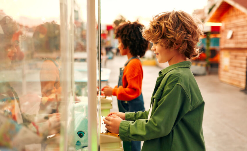 Kids having fun on a carnival Carousel